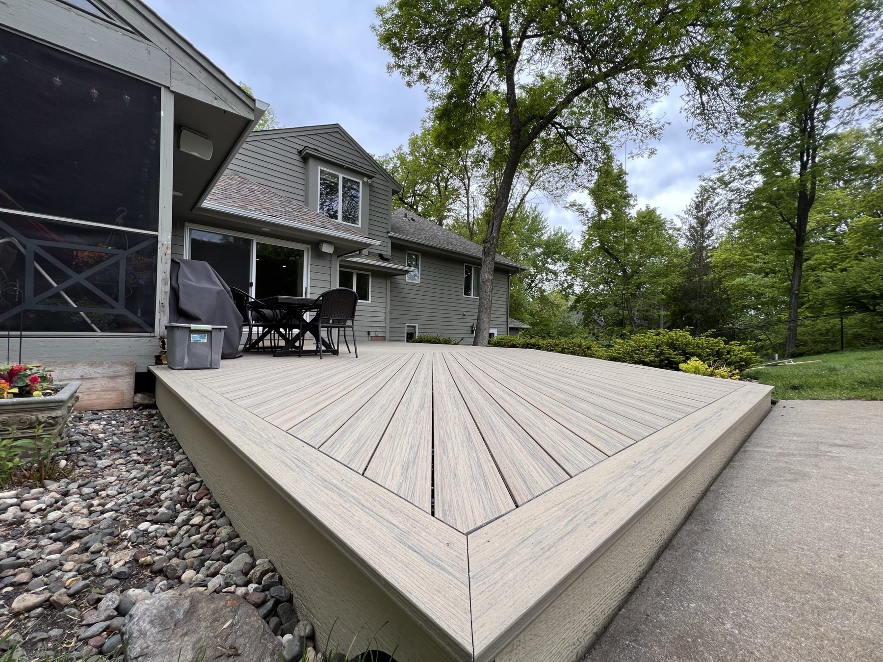Composite deck, mitered sunburst boards